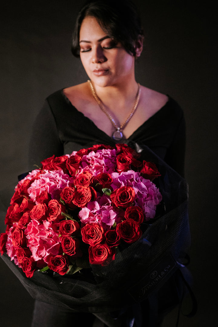 Four Dozen Cherry Red Roses